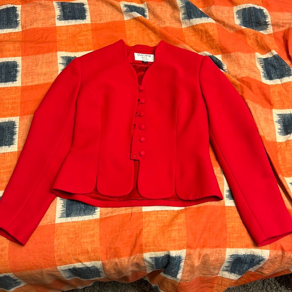 Red blazer with a cute circular design on bottom